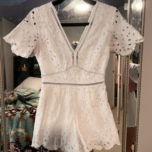 such an adorable romper!! perfect condition worn once for graduation!!